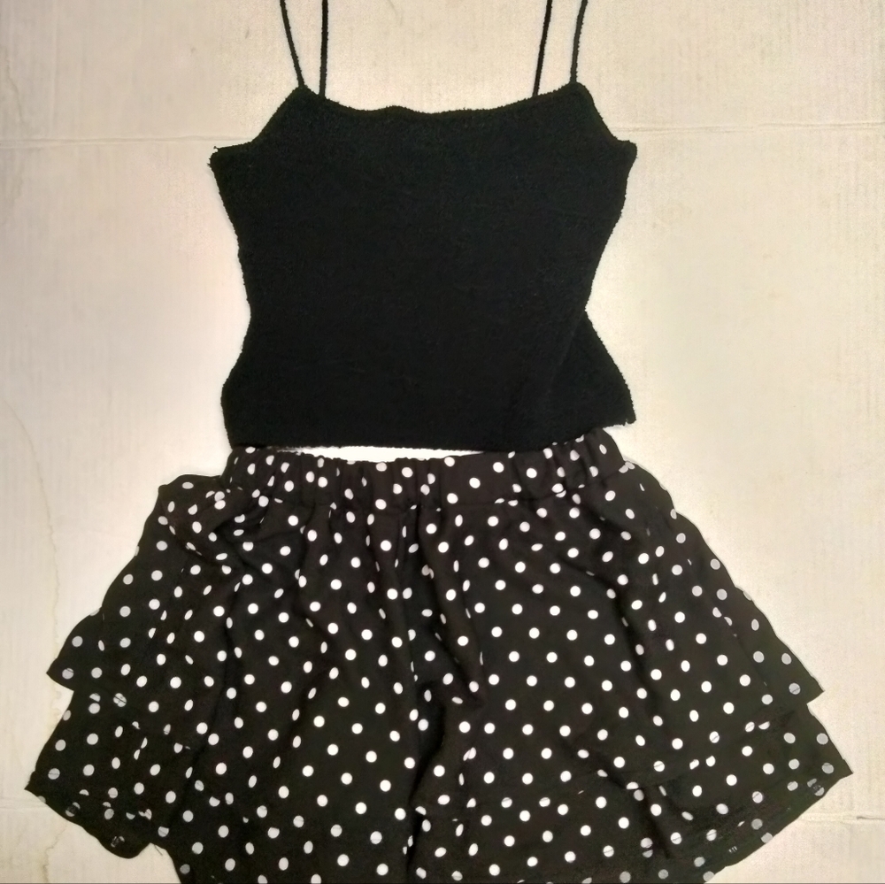 Nasty Gal polka-dot shorts with a black knit top